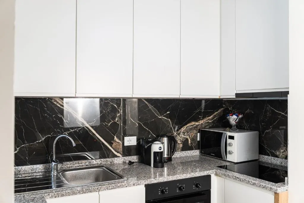 Quiet City Stay with Private Garage and 5 Min to Center